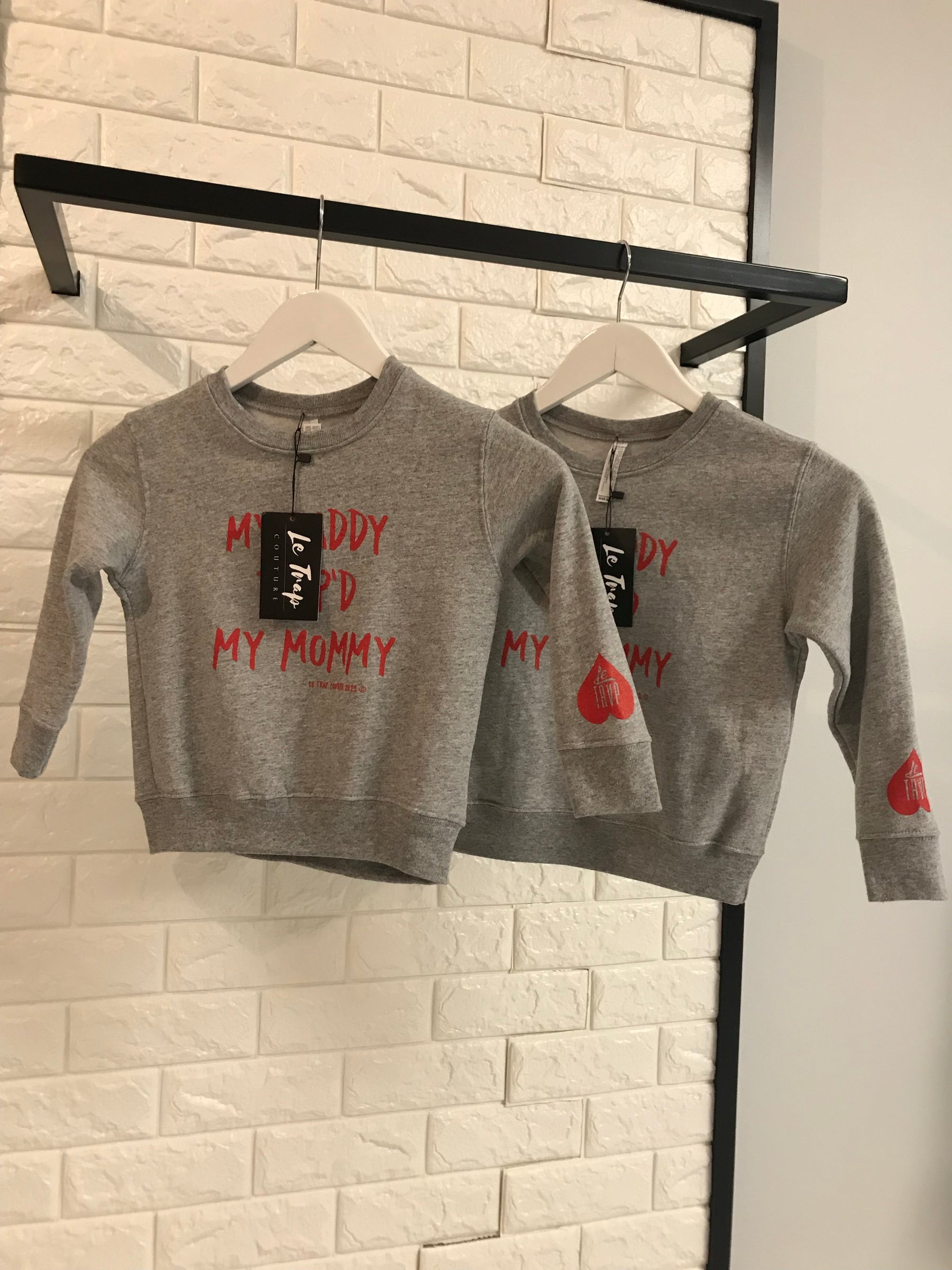 Le Trap Couture “Daddy Trap’d Mommy” Toddler Crew Neck Sweatshirt.